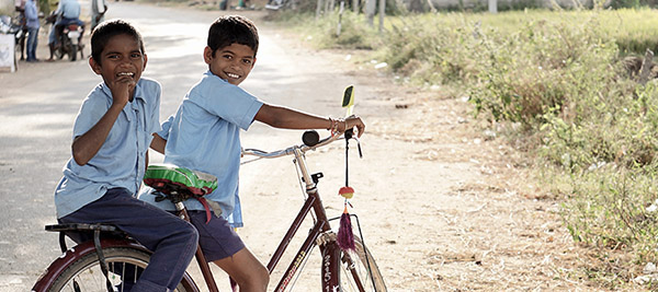 india children riding bikes, gifts