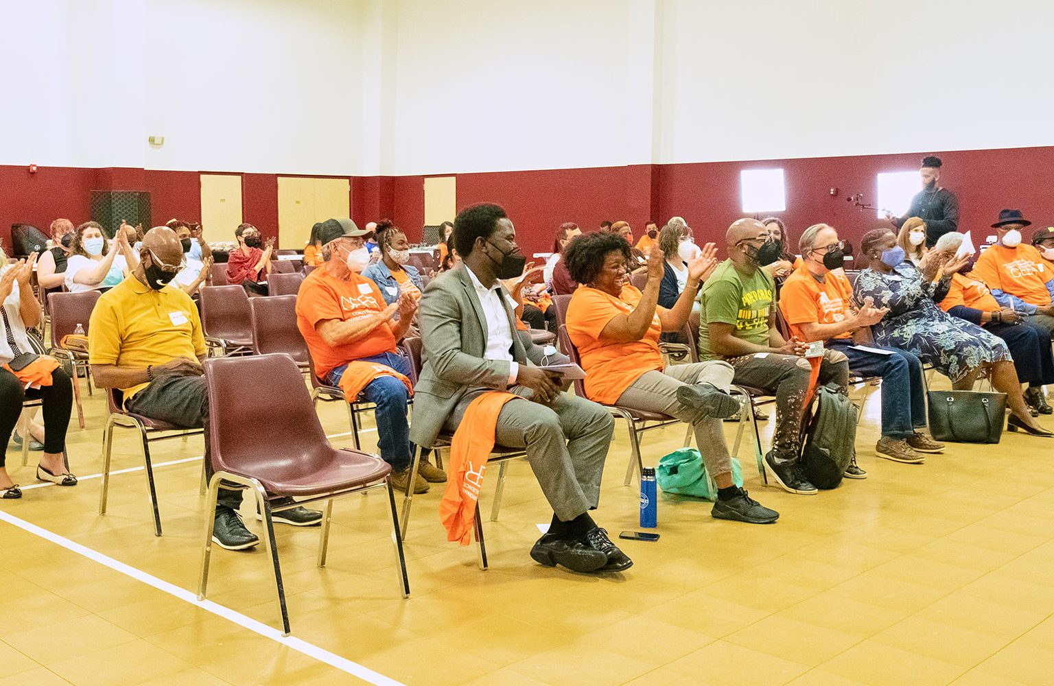 Attendees applaud speakers during the Coalition for Environment, Equity, and Resilience’s People’s Hearing event at the Carl Walker, Jr. Multi Service Center in Houston, Texas April 30, 2022. The hearing gave community members an opportunity to voice the health and environmental hardships their neighborhoods face to the Texas Commission on Environmental Quality.